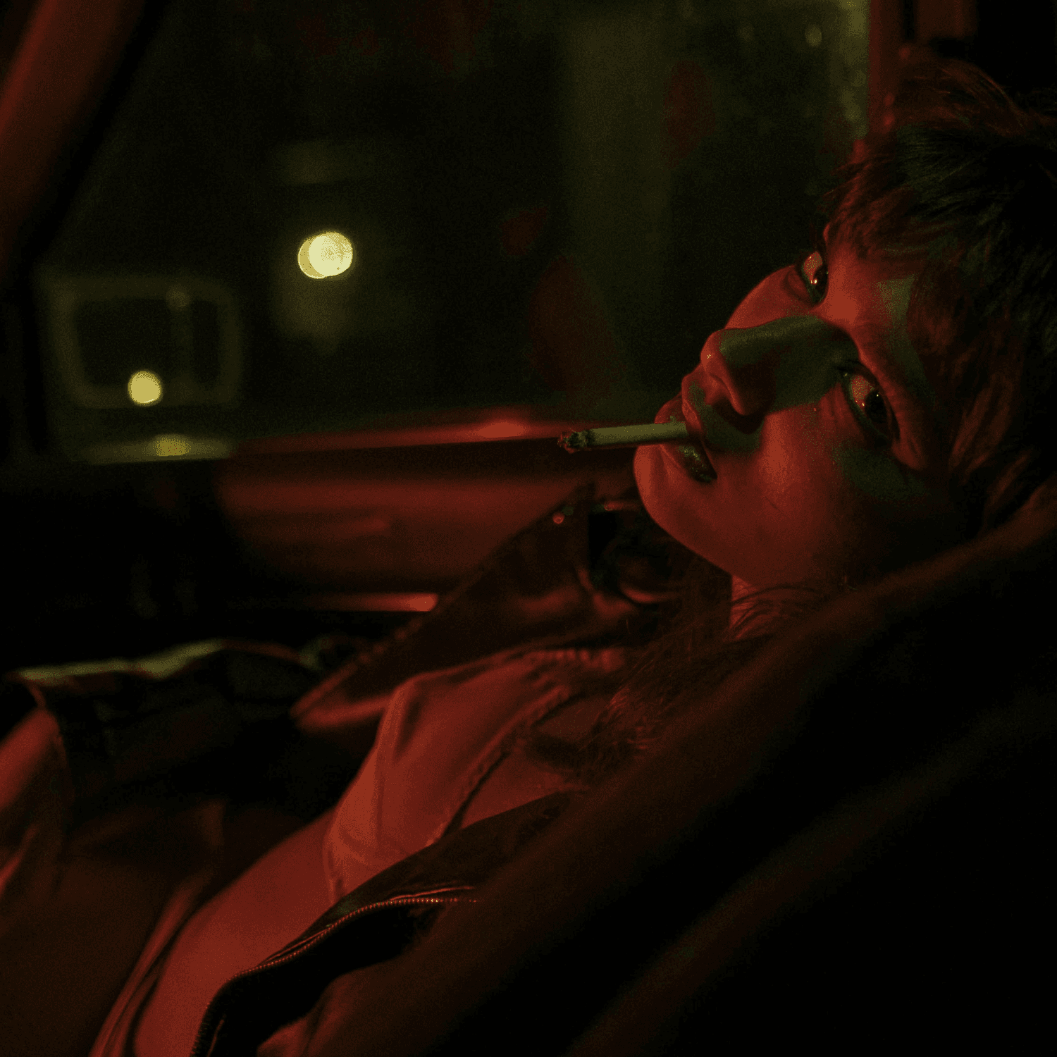 girl smoking joint in car